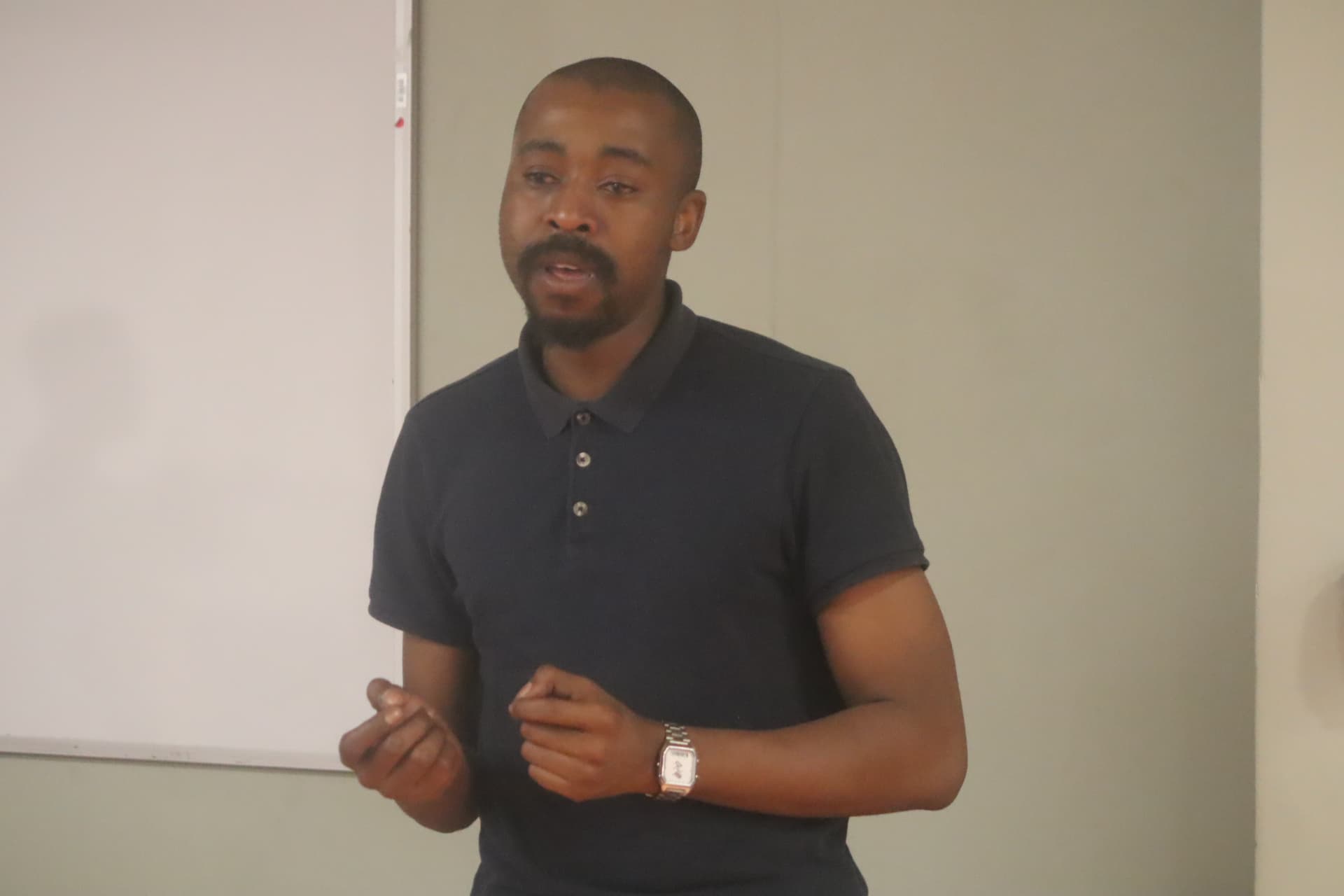 A facilitator presenting during a Northern Cape hackathon workshop